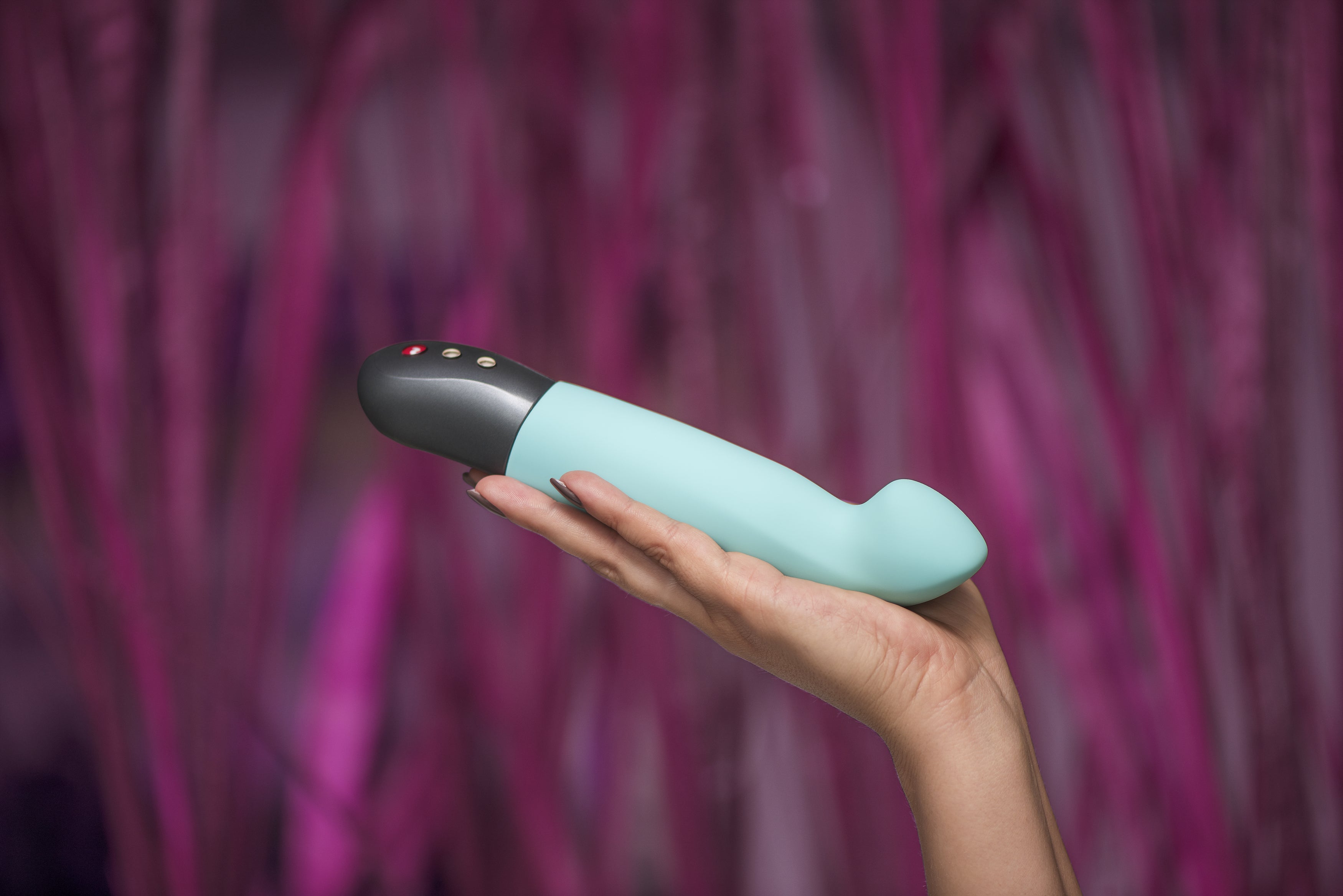 Fun Factory Stronic G Blue Vibrator (hand shot) - Melody's Room